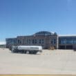 a large building with a large white truck parked outside