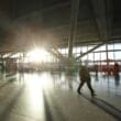 a group of people walking in a large room