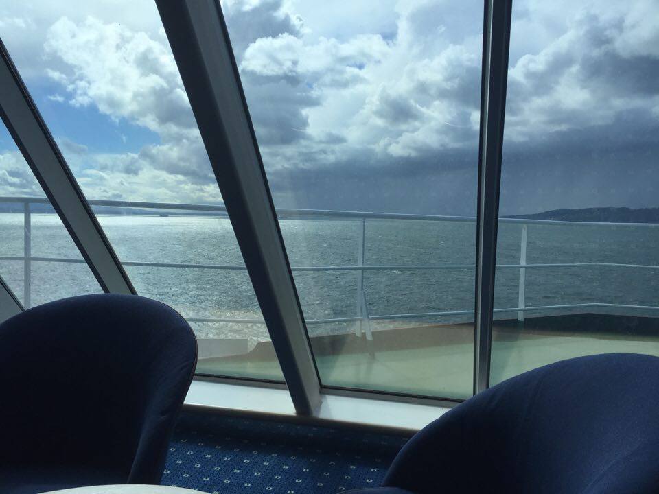 a view of the ocean from a window