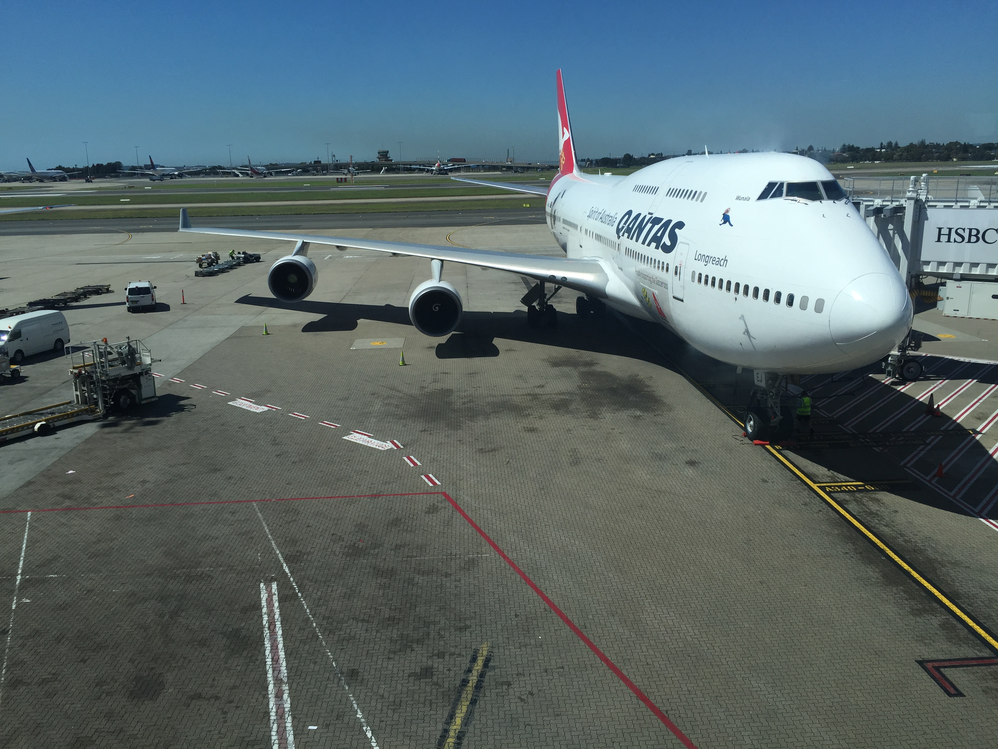 a large white airplane on a runway