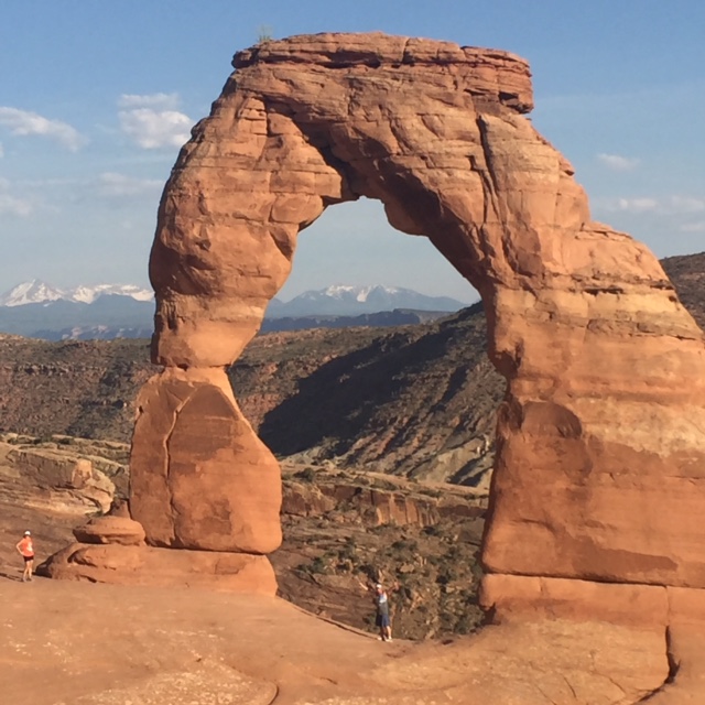 a rock arch in the desert