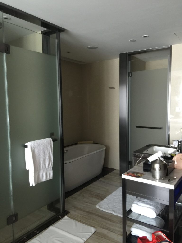 a bathroom with glass doors