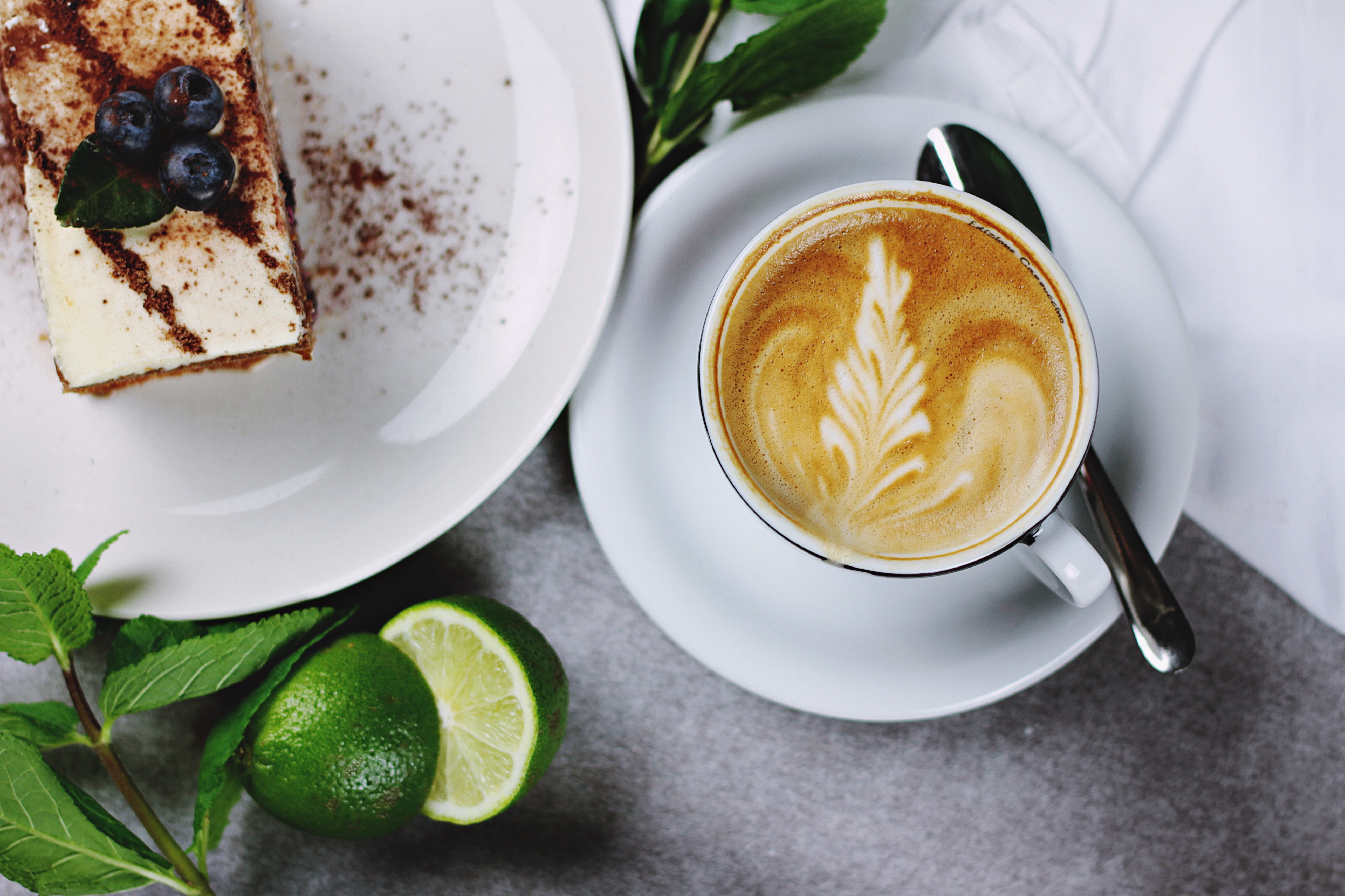 a cup of coffee and a slice of cake