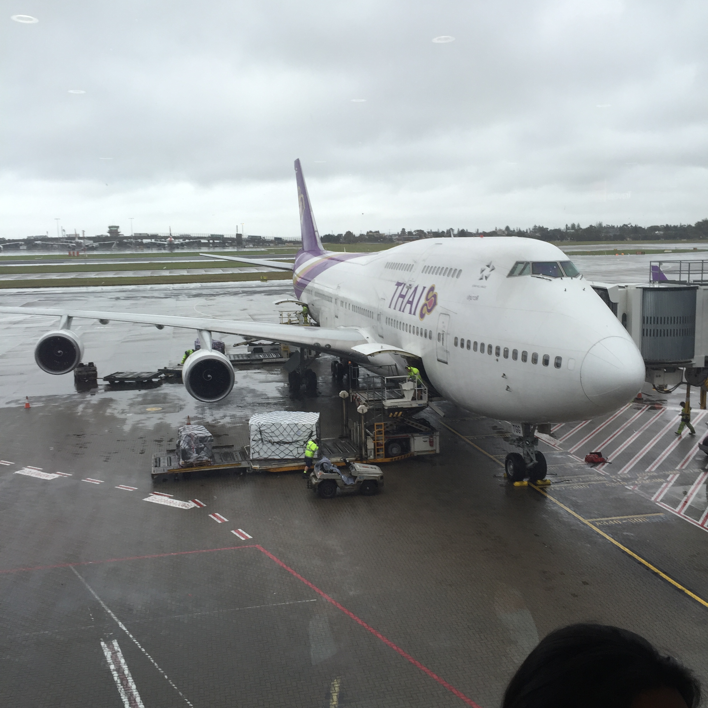 a large white airplane on a runway