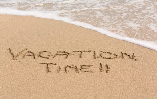 a beach with words written in sand