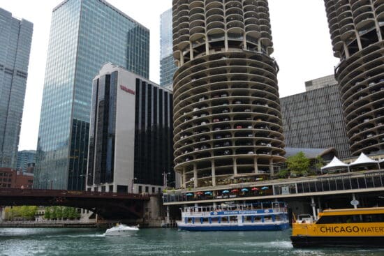 a boat on water next to a building