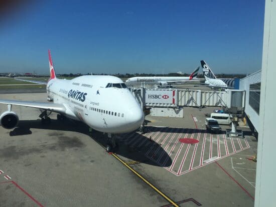 a large white airplane at an airport