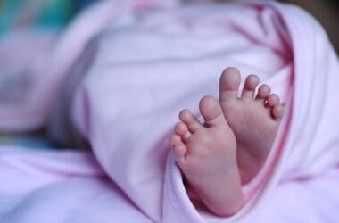 a baby feet in a blanket