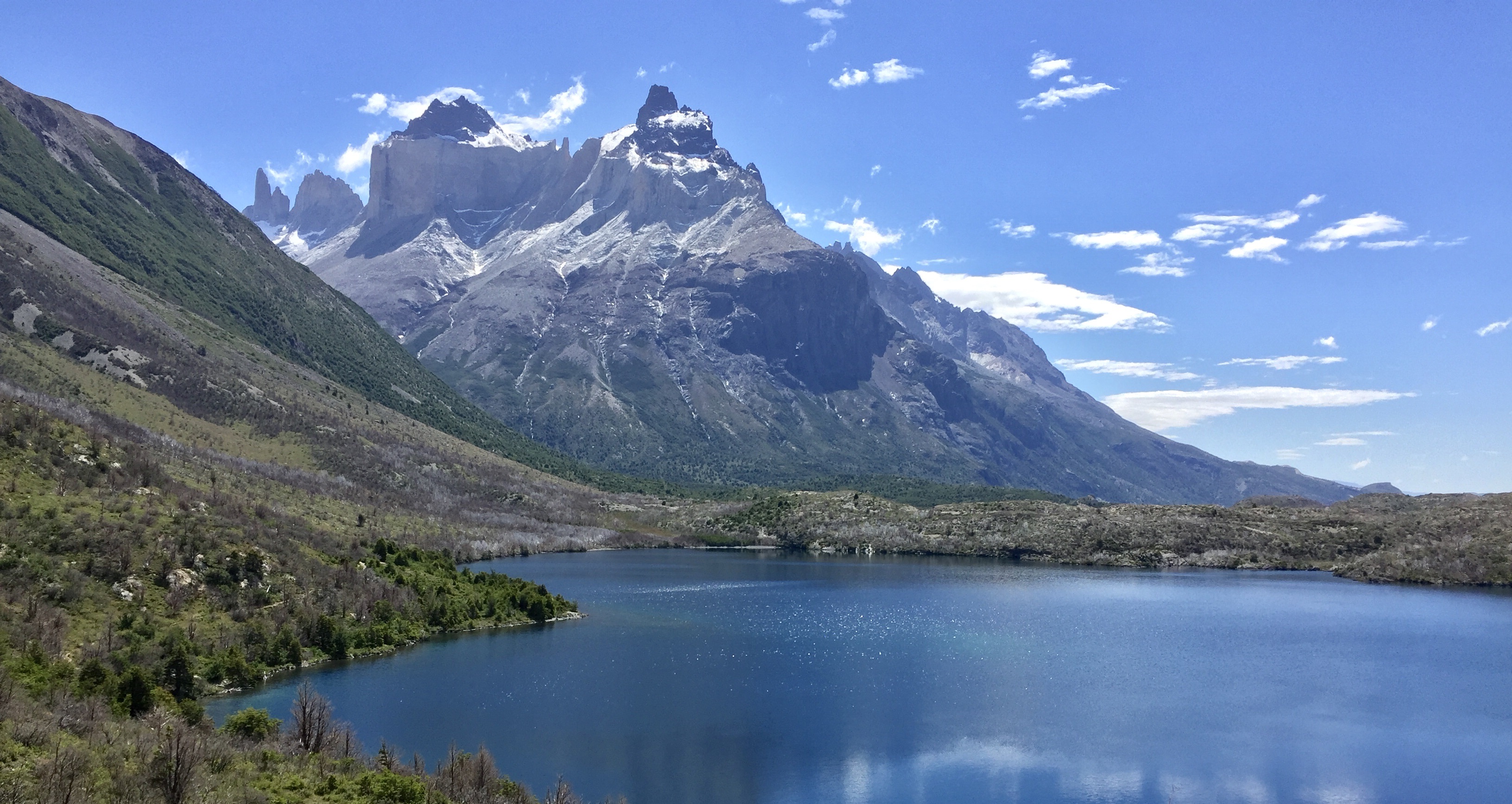 a lake surrounded by mountains