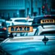 a taxi sign on top of a car