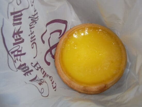 a yellow tart on a white paper