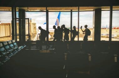 people standing in a window