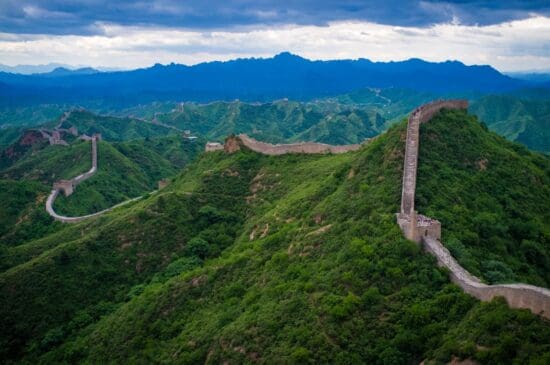 a large wall on a mountain