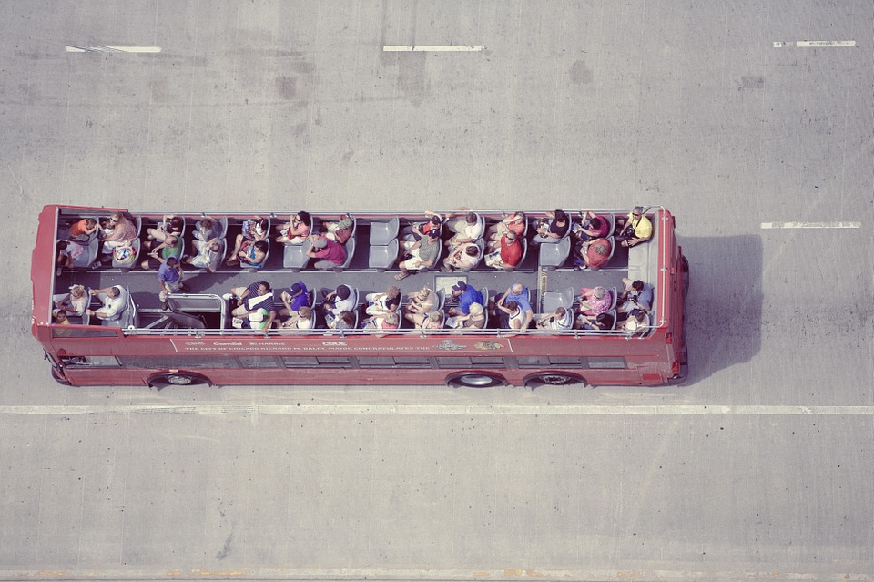 a bus with people on top