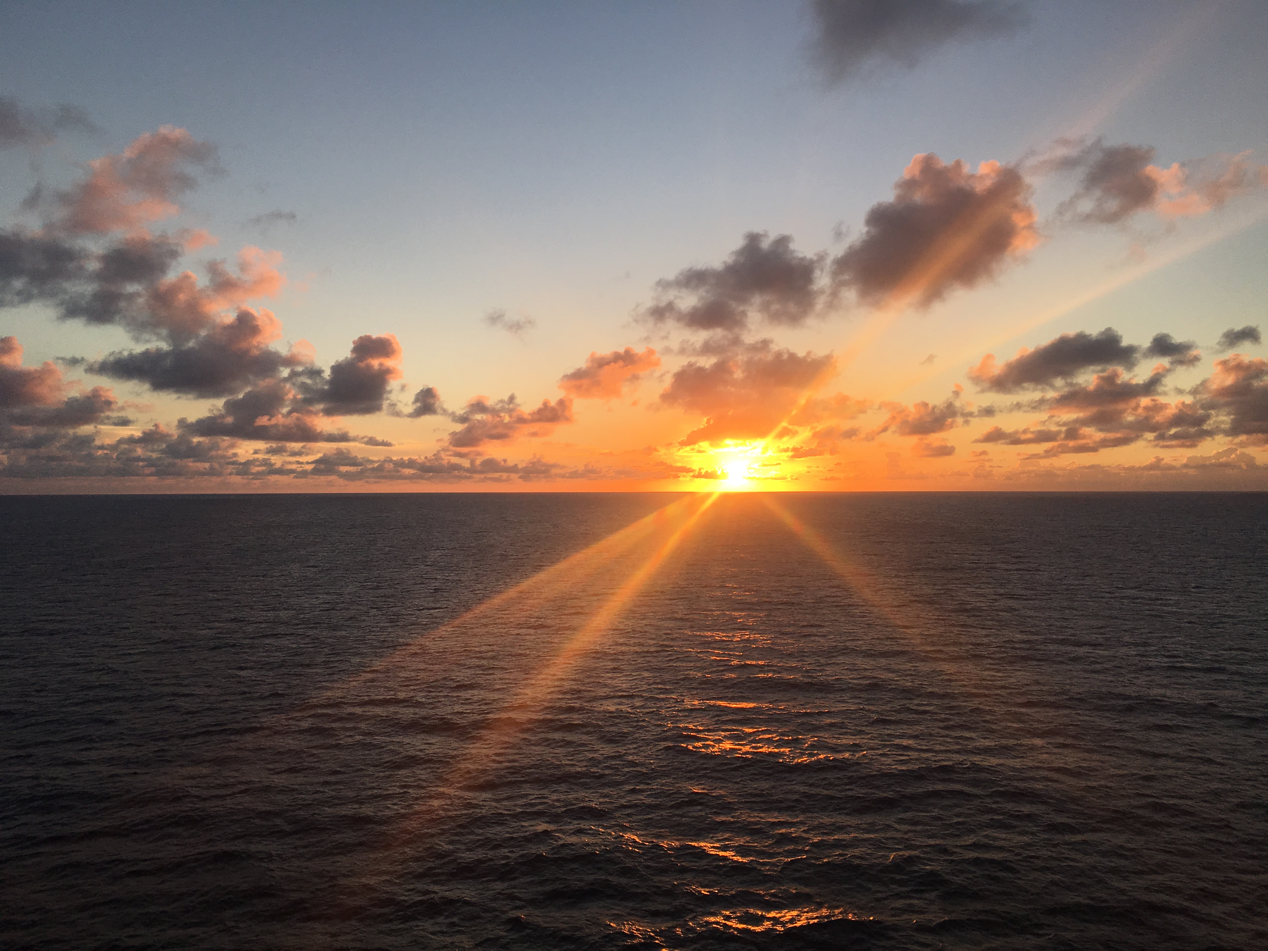 a sunset over the ocean