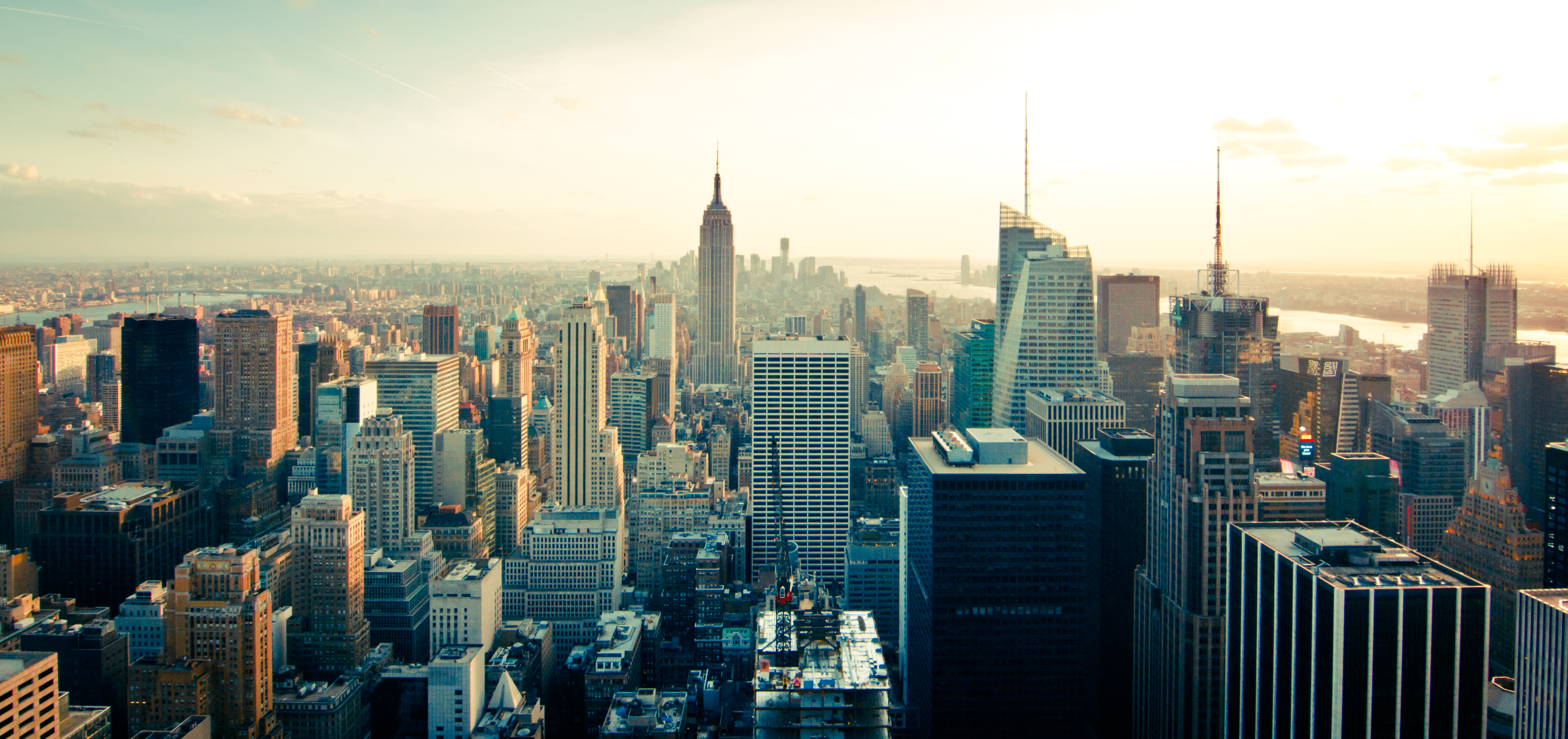 a city skyline with tall buildings