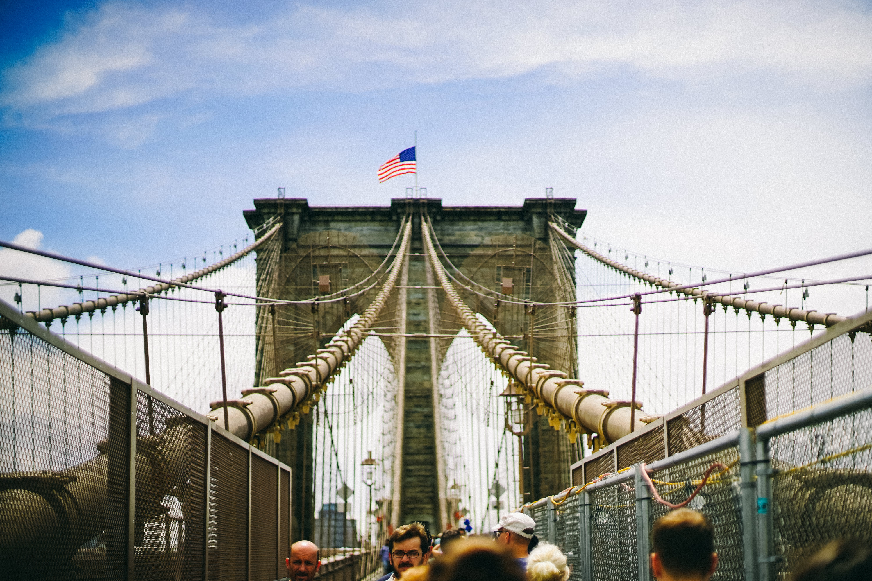 a bridge with a flag on top