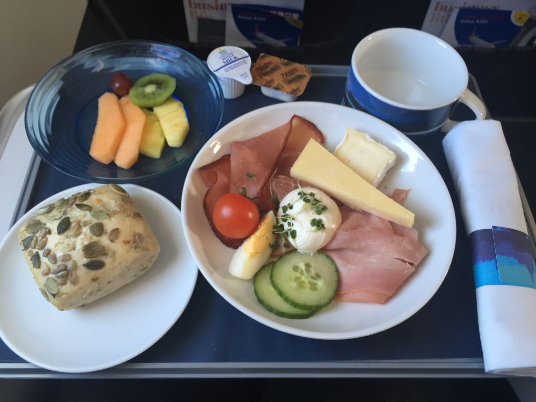 a plate of food on a tray