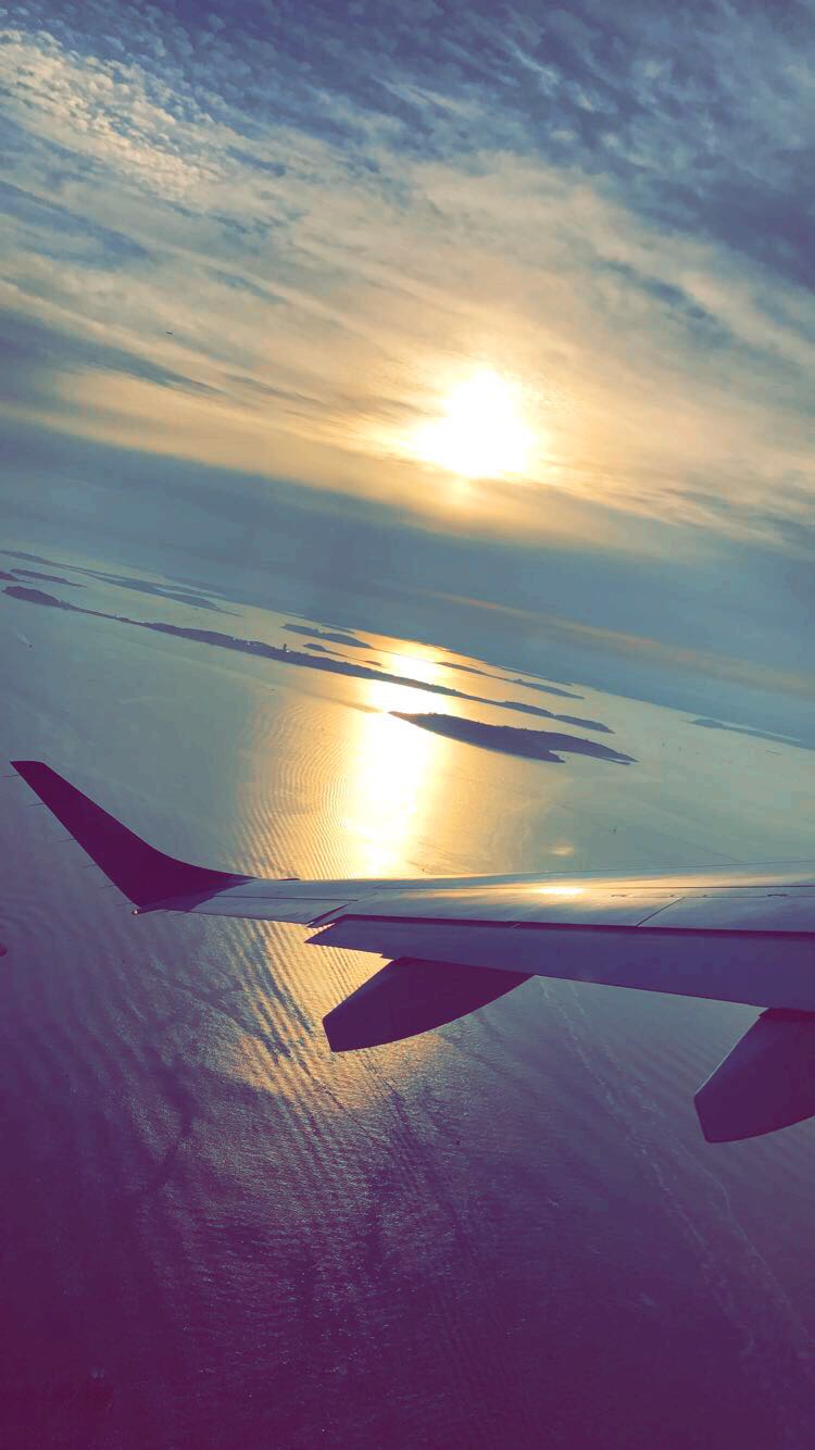 an airplane wing above water