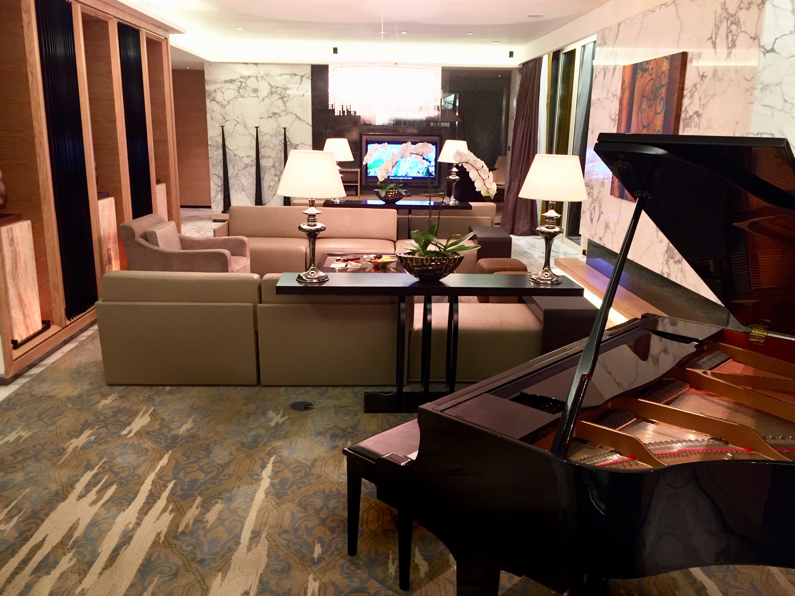 a room with a piano and a couch