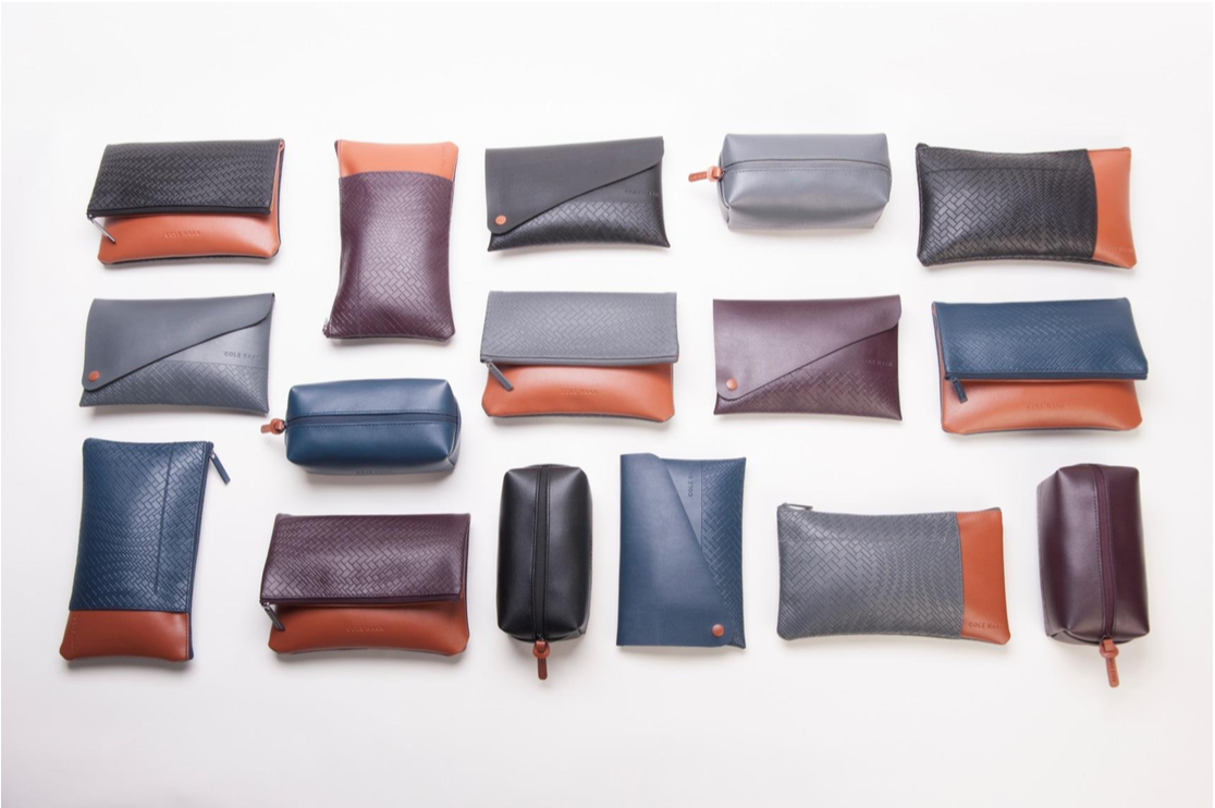 a group of different colored wallets