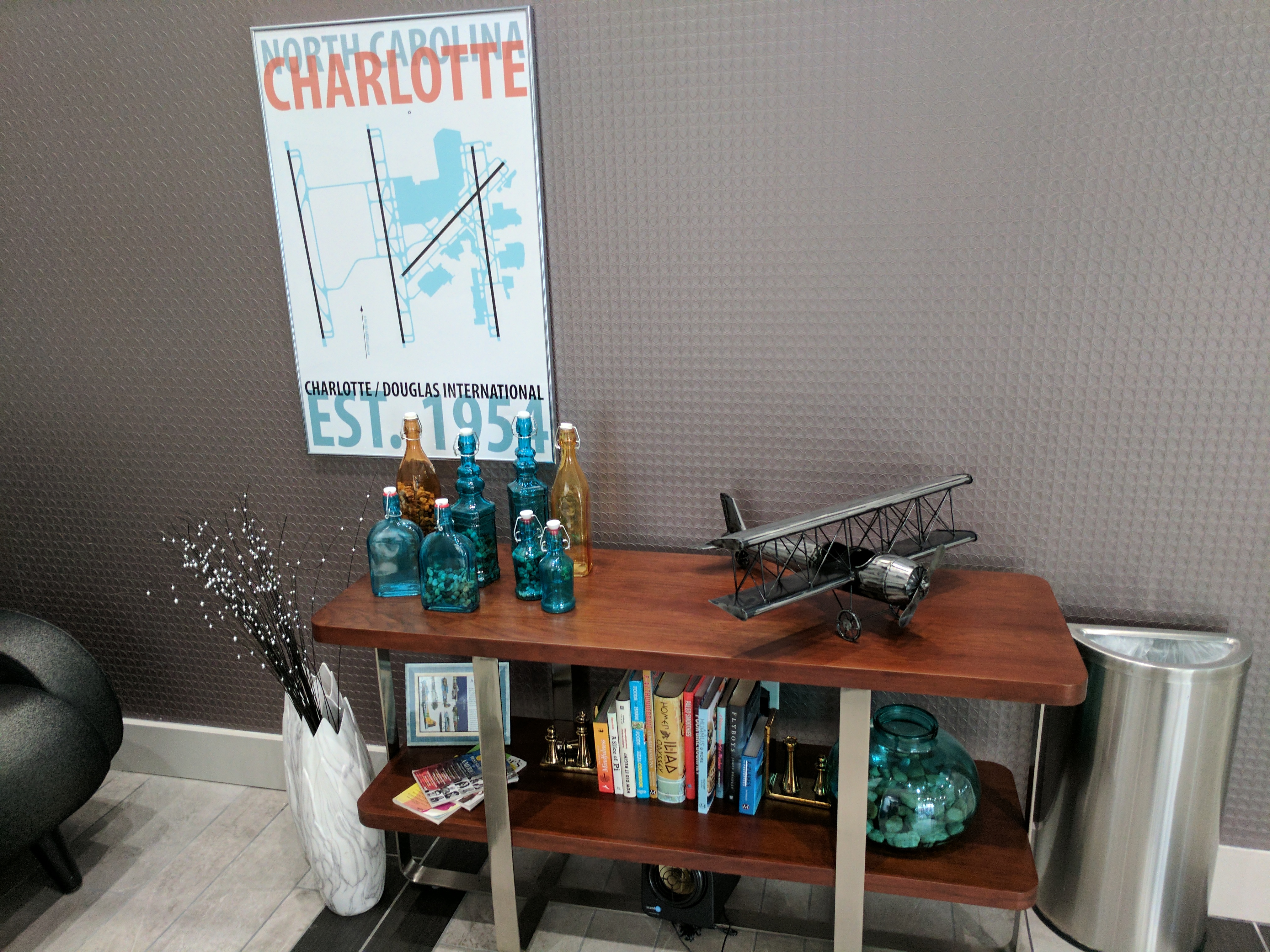 a shelf with a model airplane on it