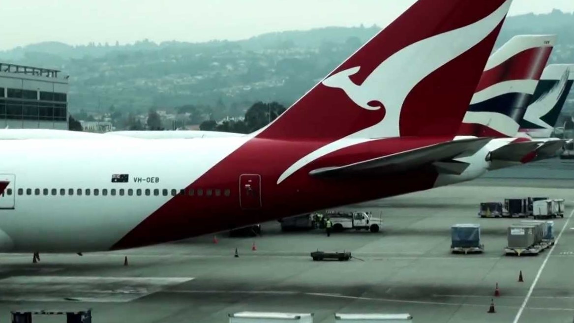 a red and white airplane