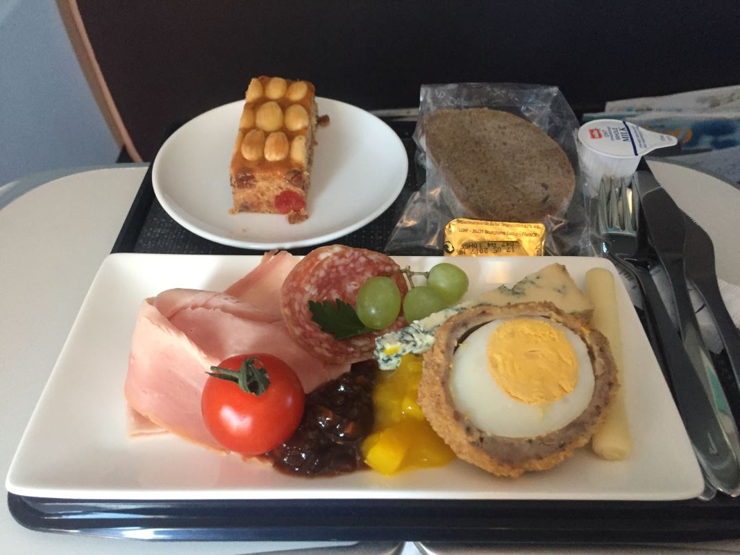 a plate of food on a tray