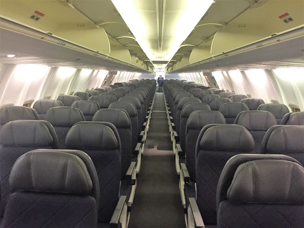 an airplane with rows of seats