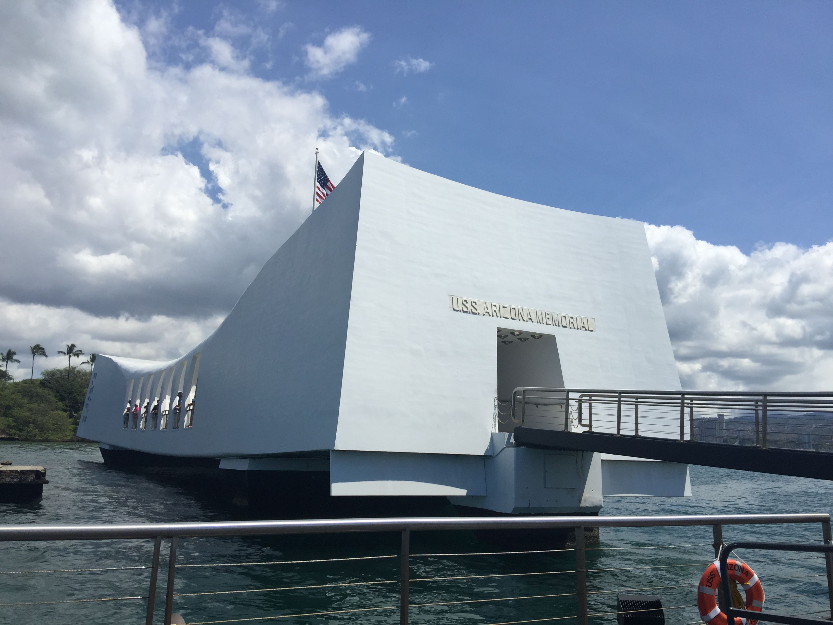 a white building with a flag on it