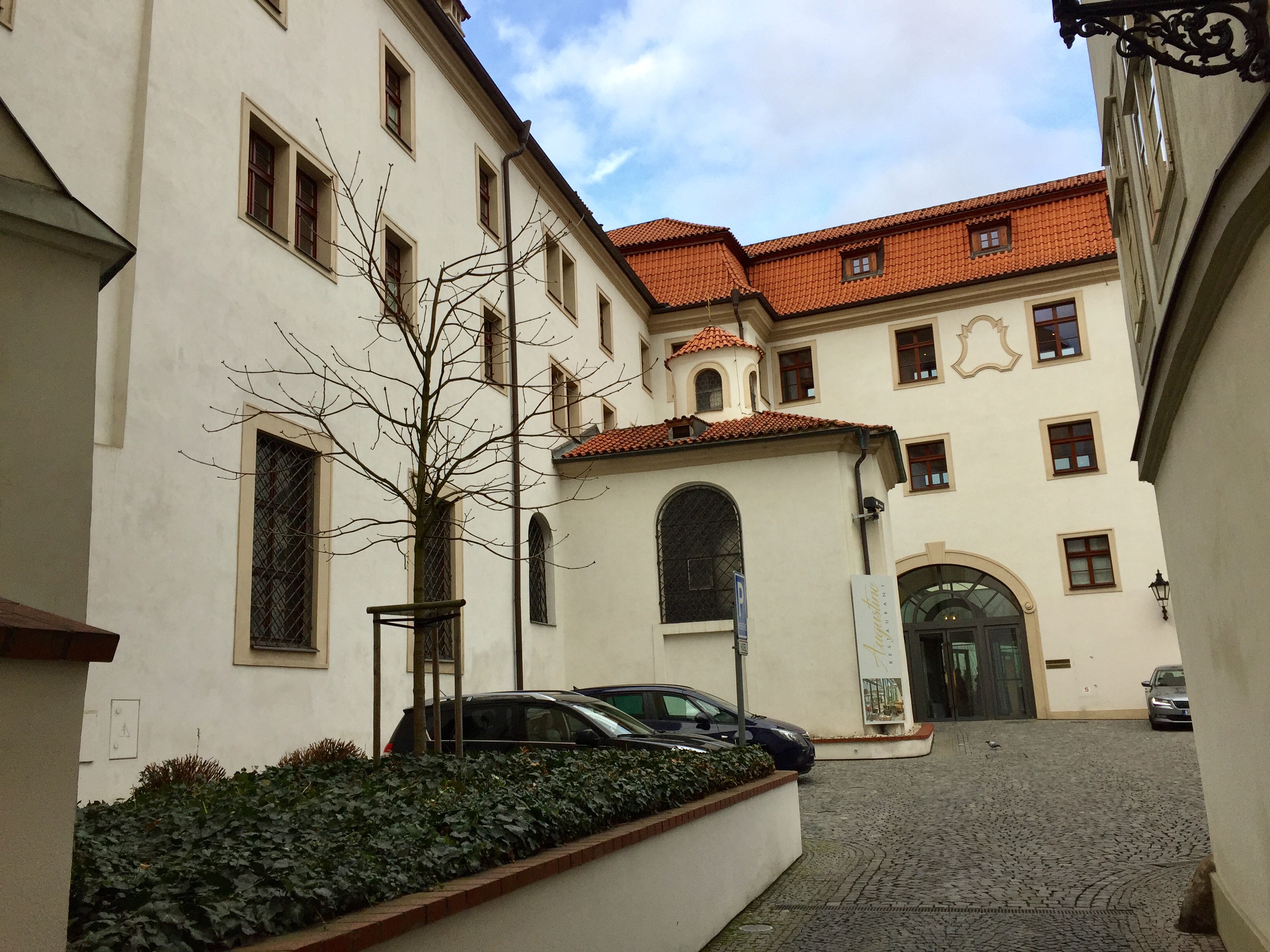 a building with a tree in front of it