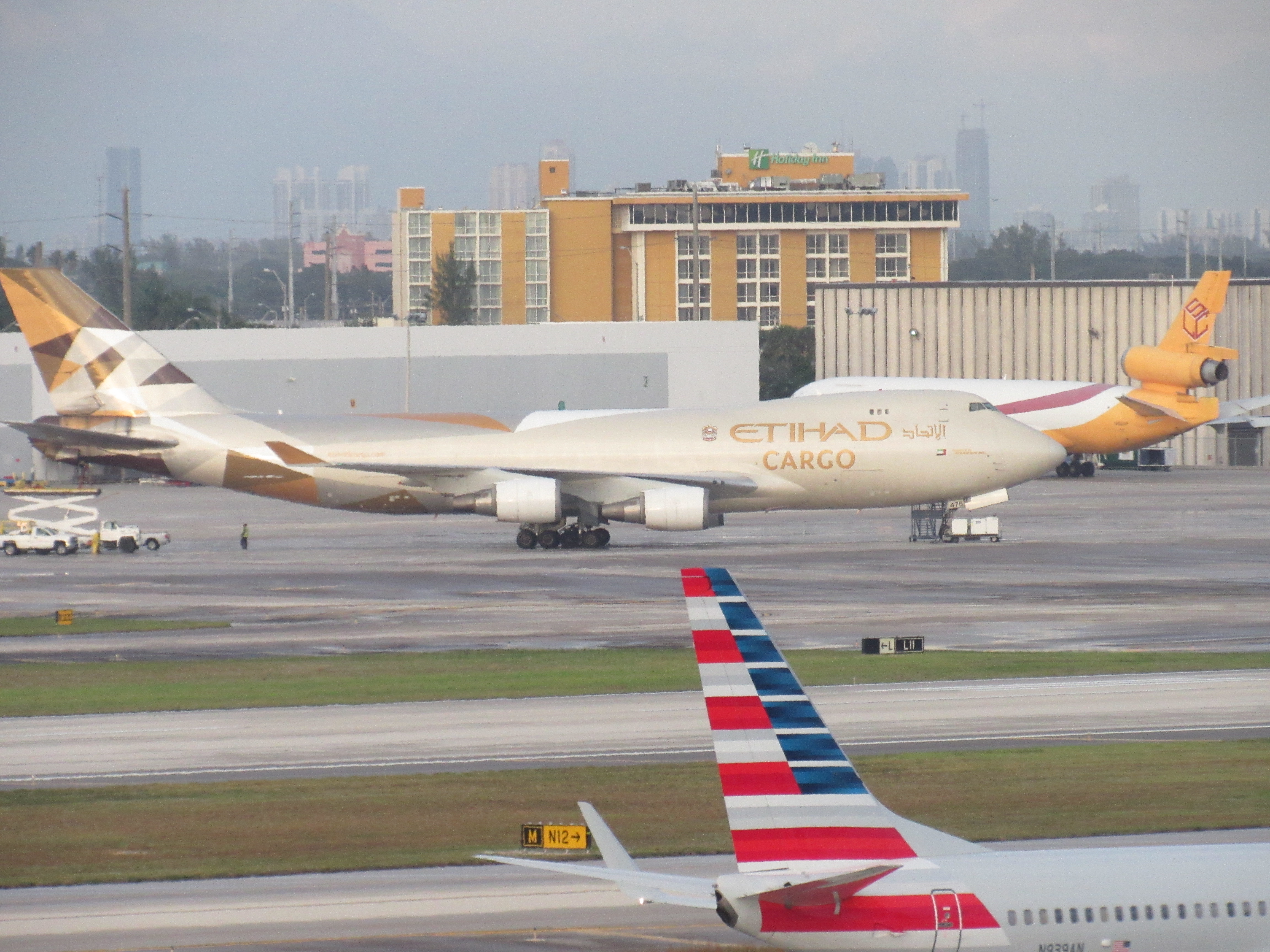 Etihad Cargo 747 Next to American Aircraft