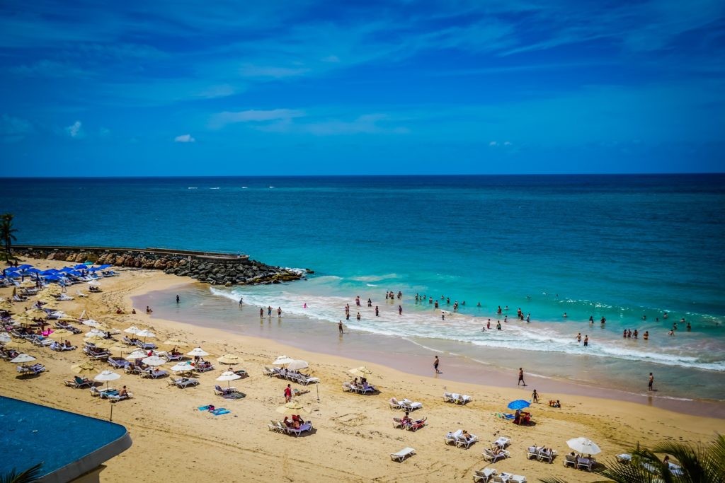 a beach with people on it