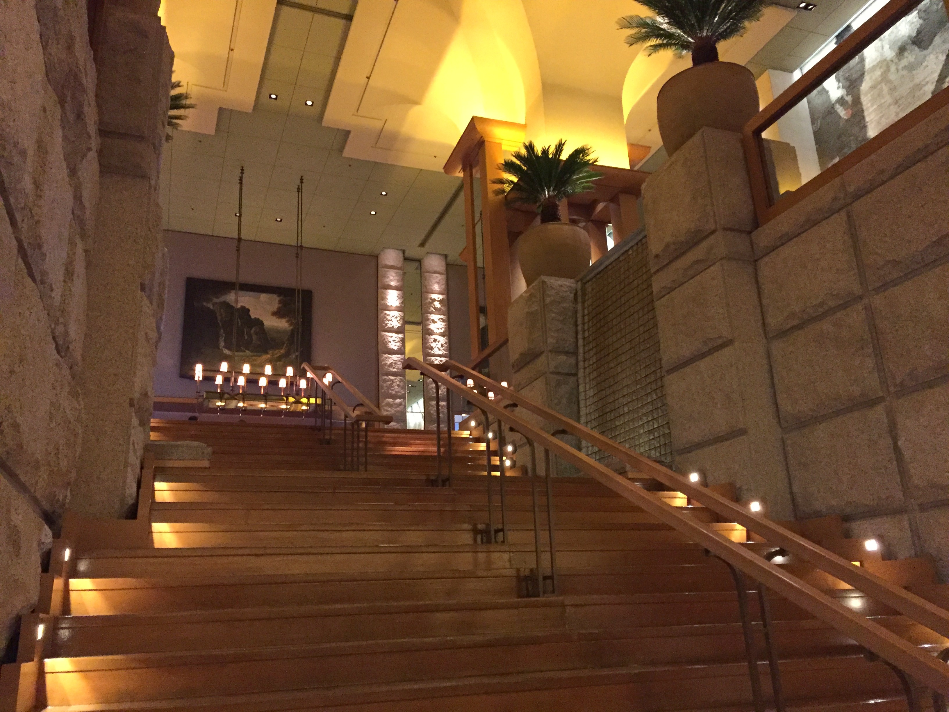 a staircase with lit up candles