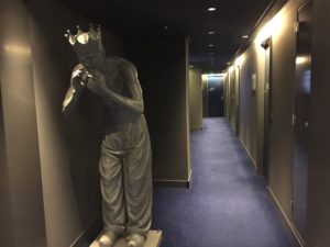 a statue of a man in a hallway