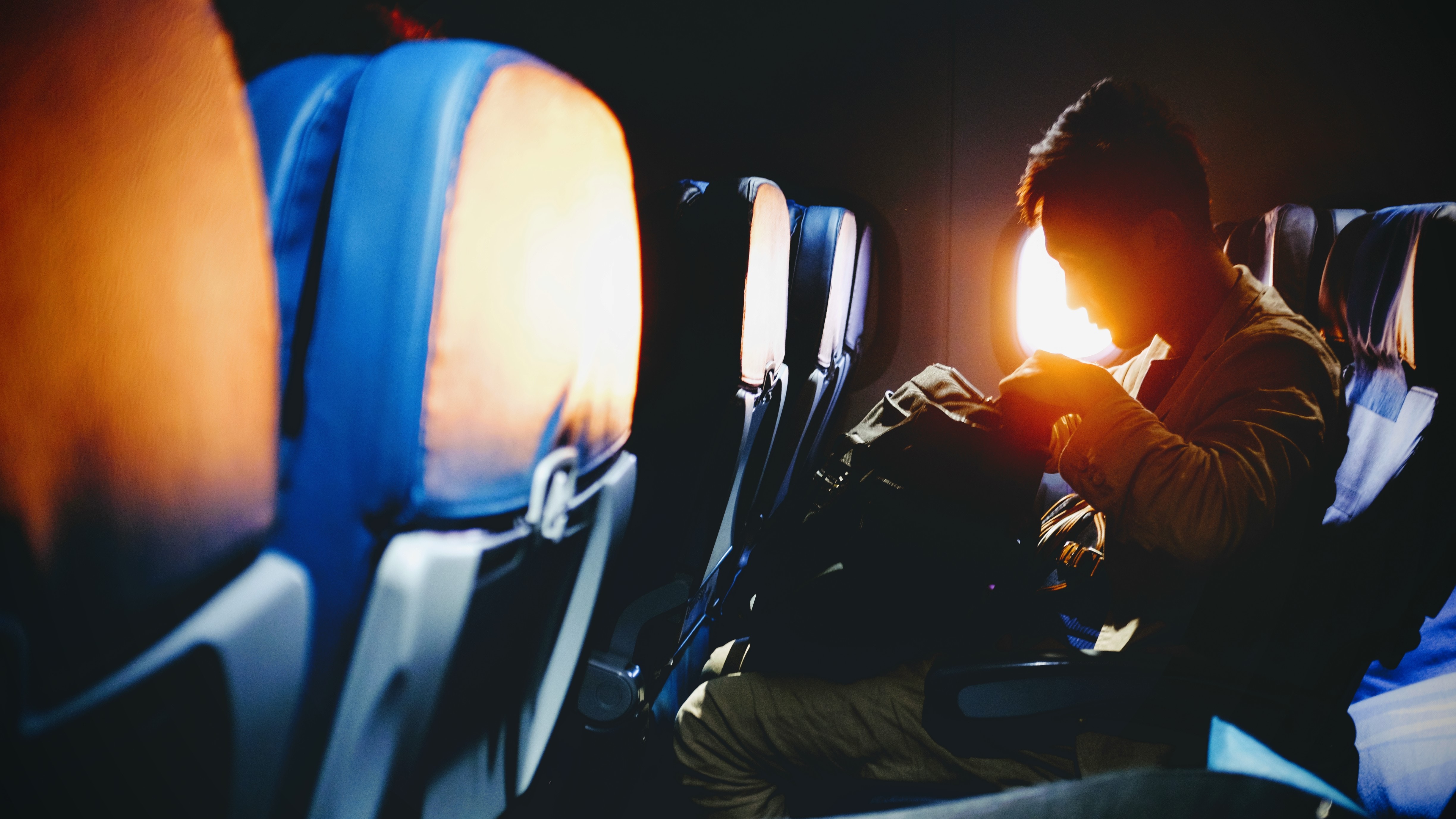 a man sitting in an airplane