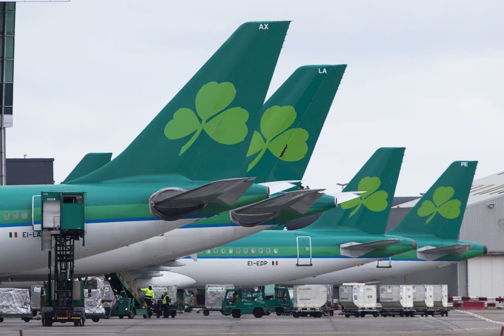 a group of airplanes with four leaf clovers painted on them