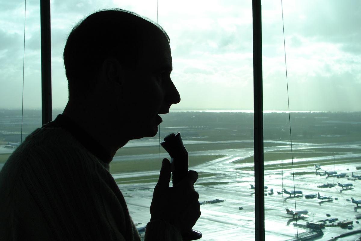 a man talking into a microphone