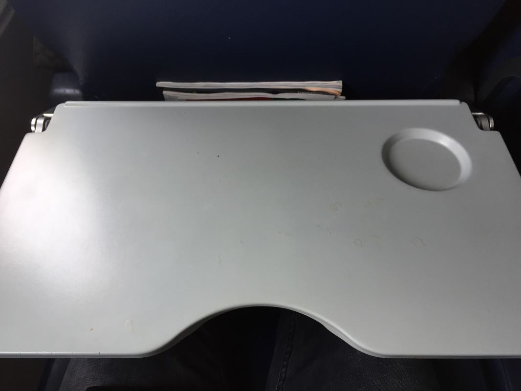 a white tray on a chair