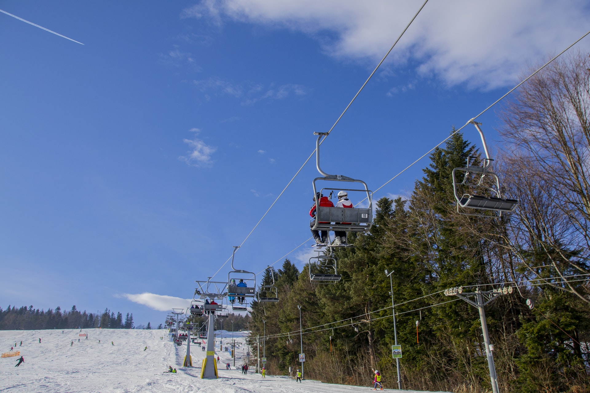 a ski lift with people on it