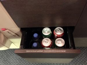 a group of cans in a drawer