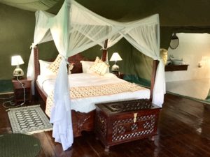 a bed with a canopy over it