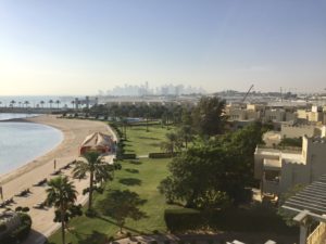 a view of a beach and a city from a high angle