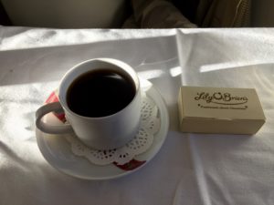 a cup of coffee on a saucer