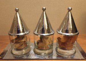 a group of glass containers with food inside