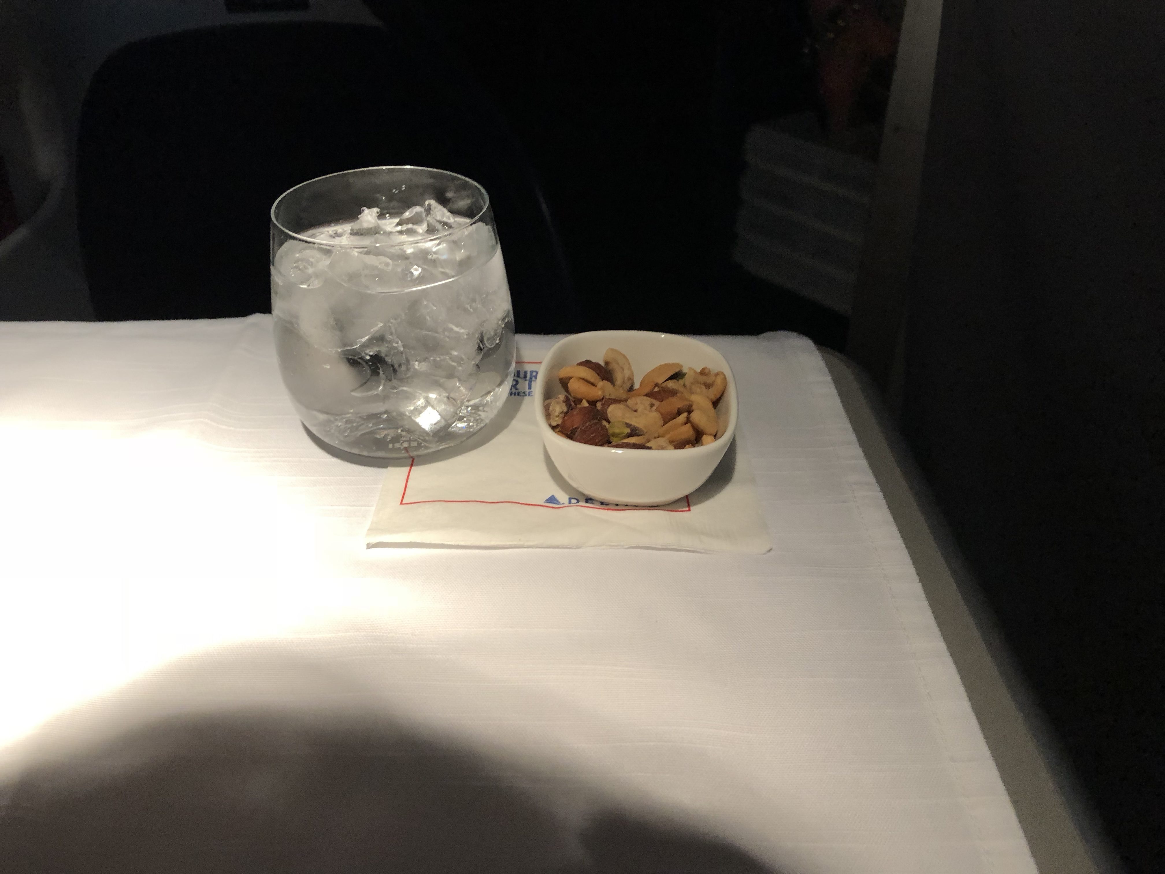 Delta One beverage service with nuts, Sydney to Los Angeles