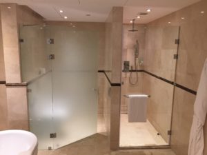 a shower with glass doors