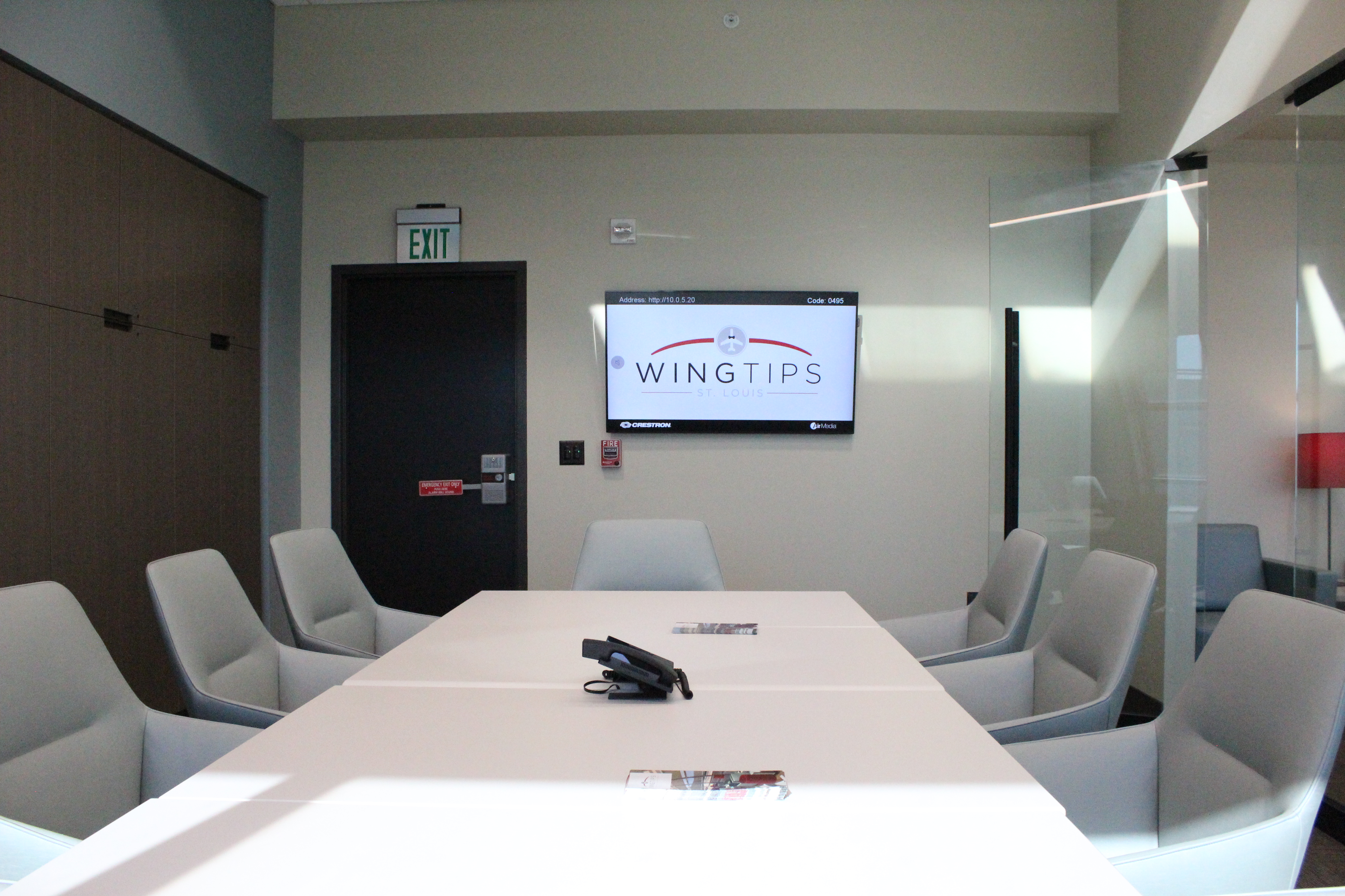 Conference seating at the conference room, available for a fee at the Wingtips Lounge St. Louis