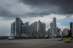 a city with tall buildings and cars