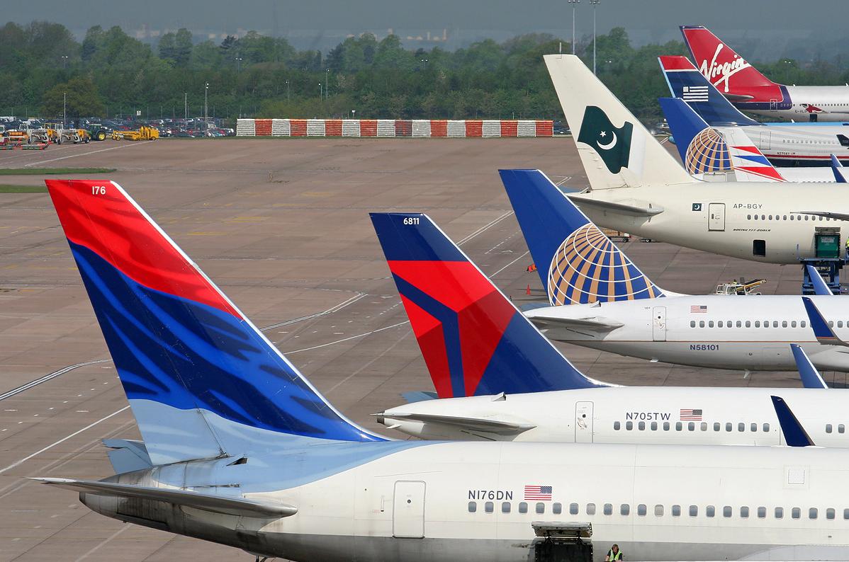 airplanes parked on a runway